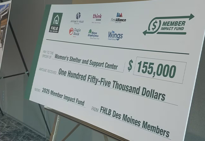 A donation check for $155,000 to Women's Shelter and Support Center